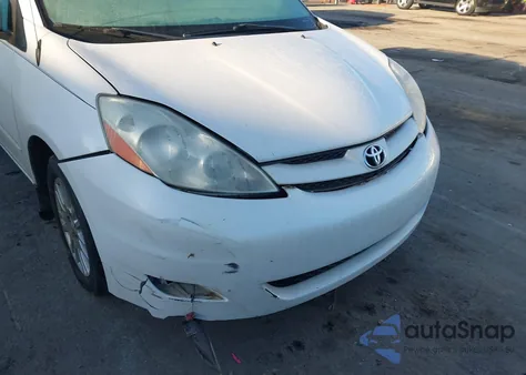 2009 Toyota Sienna Xle z USA, uszkodzony, nr VIN 5TDZK22C09S255844